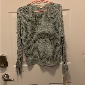 NWT blue sweater with lace up sleeves. Size S